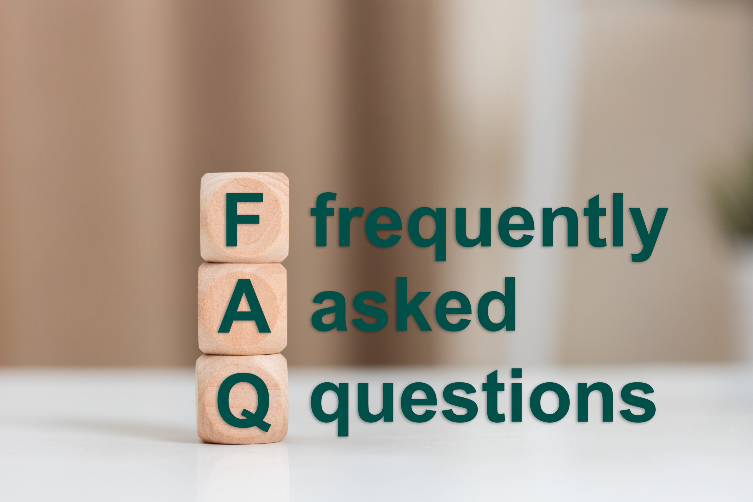 FAQ text (frequently asked questions), Text FAQ on wooden cube, Scrap metal pickup.